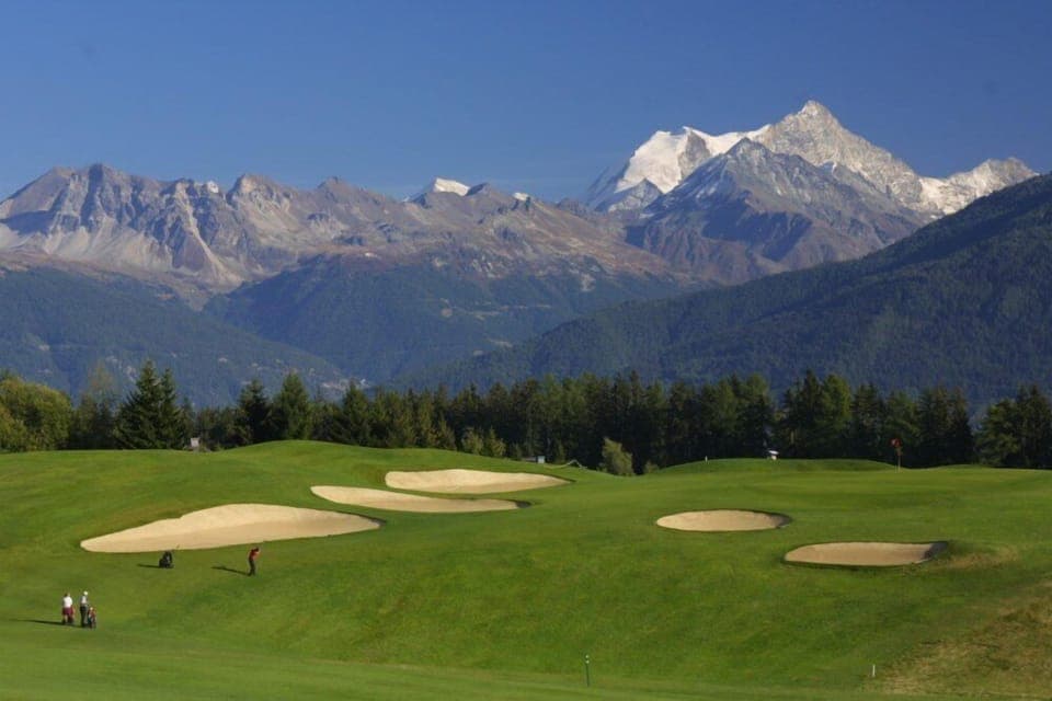 Tee off onto the mountains from the world famous 18-hole golf course of Crans!
