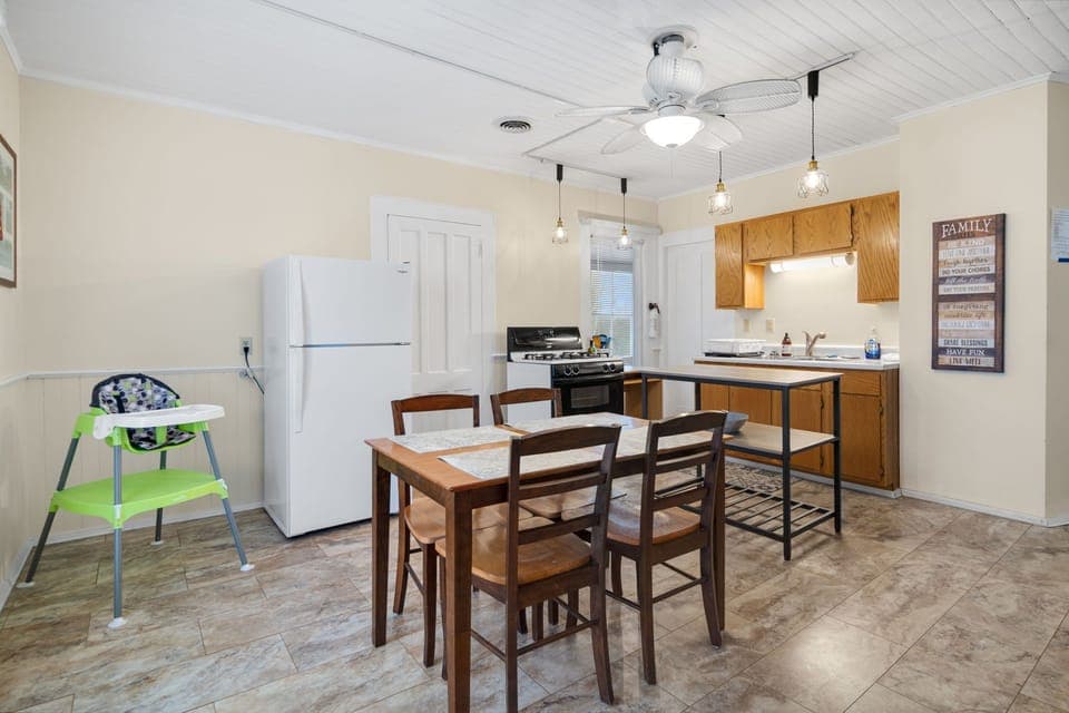 Large  kitchen in this beautifully remodeled home. Vinyl floor, double windows. 