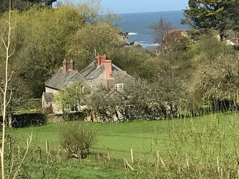 2 minutes from the beach, surrounded by 3 acres of flat glorious country side