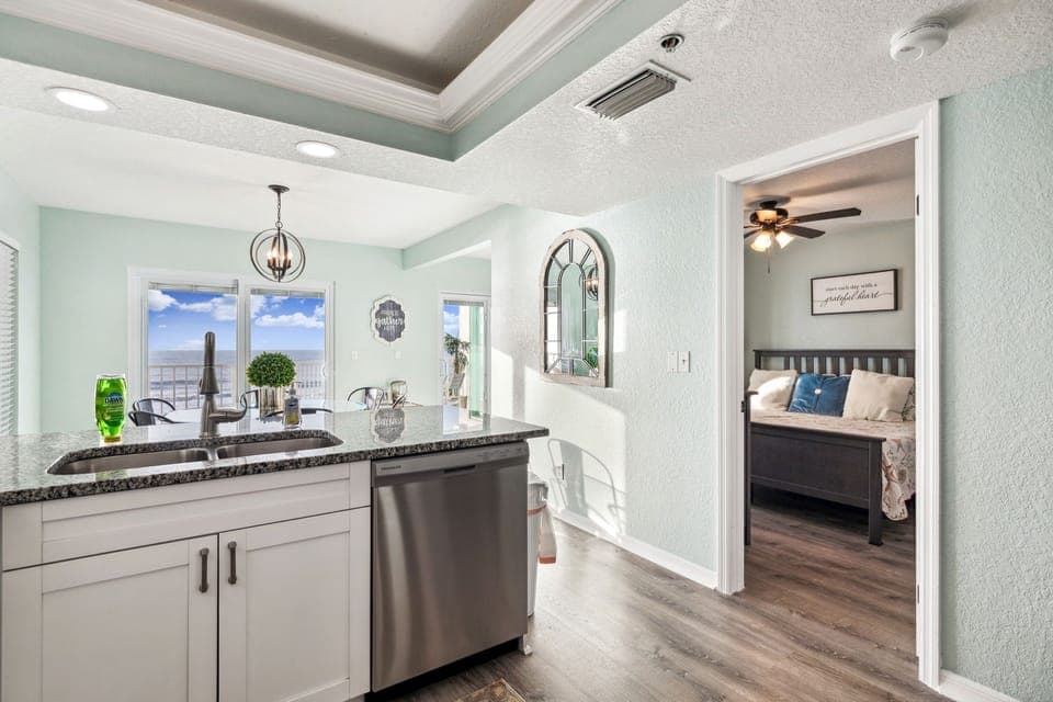 Stainless dishwasher, microwave, fridge and stove.