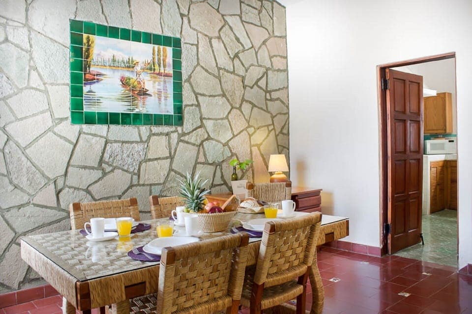 Dining room with handmade palm table and chairs.