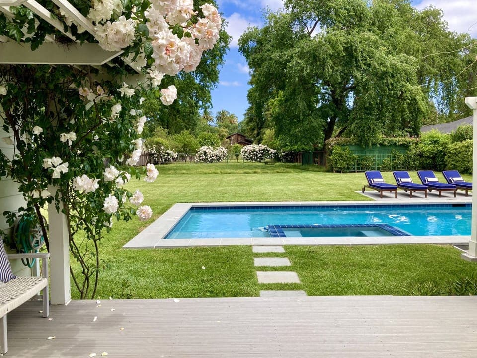 Pool and backyard from deck off kitchen