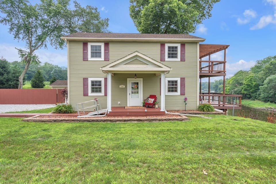 Front View of House with Accessible Ramp and Walkway. 