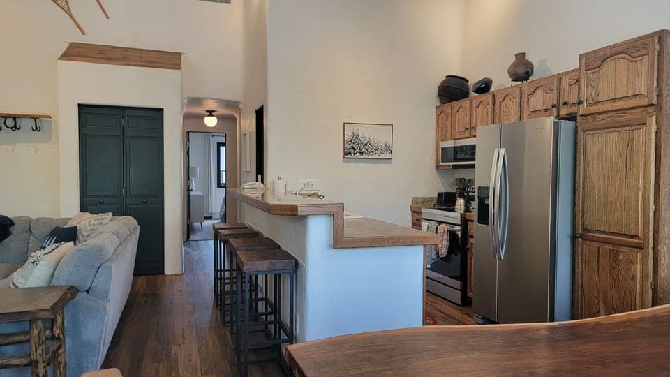4 Counter-side bar stools for additional seating options.