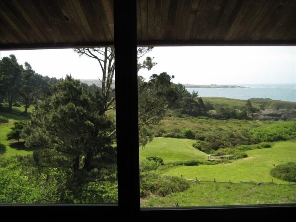 Partial view from upstairs bedroom.  It's looks like Pebble Beach I believe!