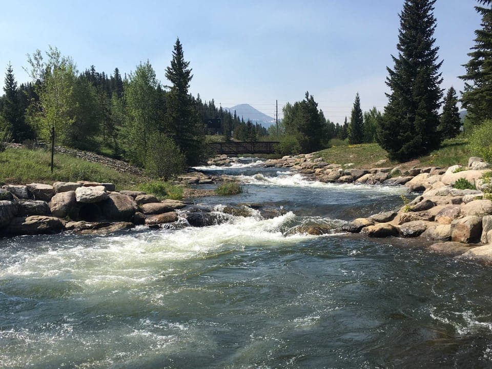 The Blue River winds through Breckenridge, offering stunning scenery and excellent fly fishing opportunities for anglers of all skill levels.