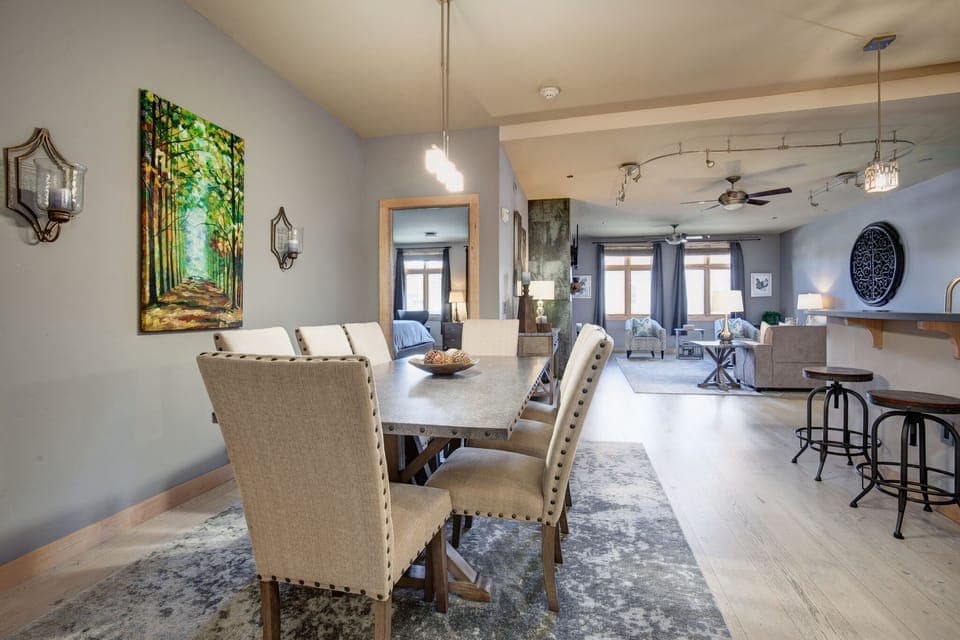 Large modern dining table with seating for 8! Original artwork and HIGH END deco