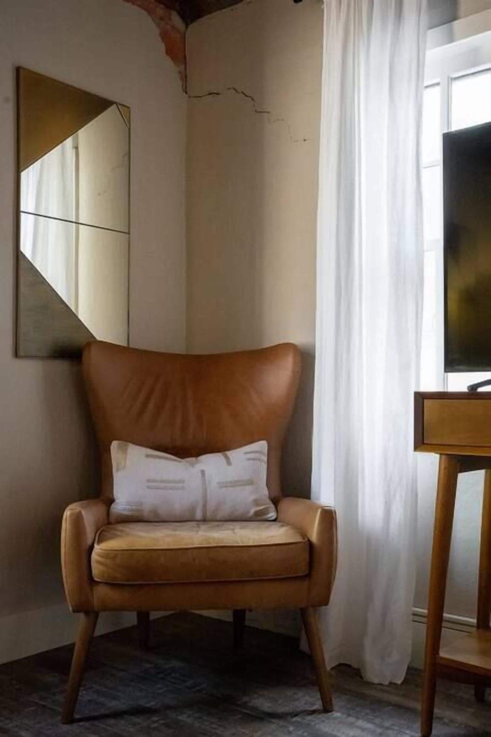 Reading Nook – Cozy chair for quiet moments.