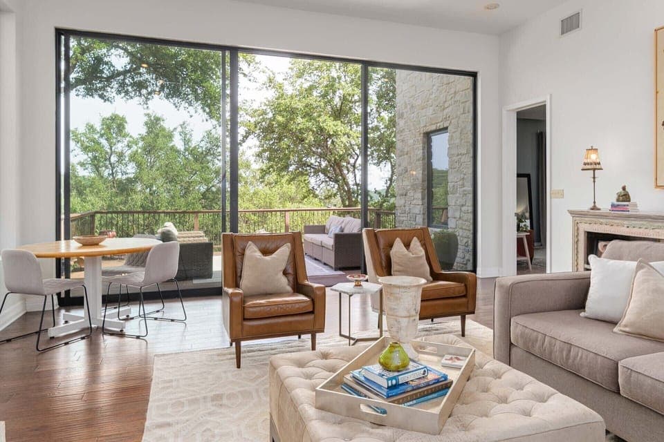 Gorgeous and open great room with views of the outside welcomes you in the home.