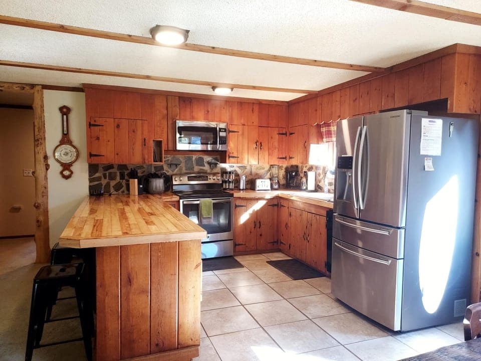 All the gadgets and kitchen supplies of home - just bring the food - 