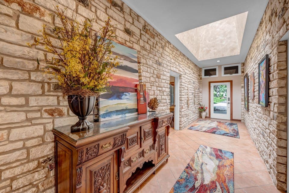 Stone entry way - splits the house into 2 sides