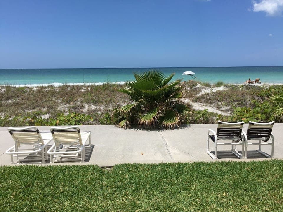 Step out the door to this amazing water view and few steps to the  beach.