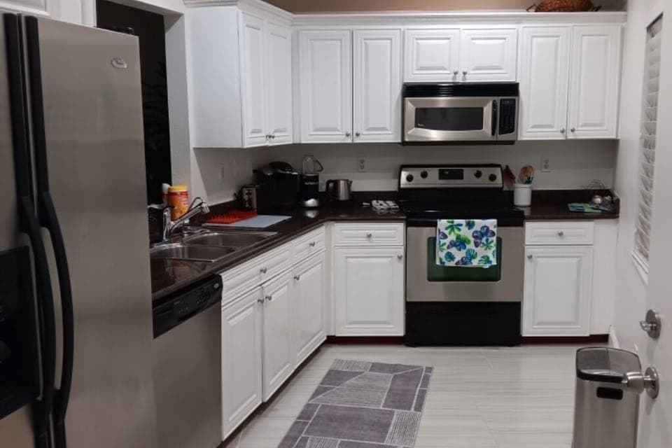updated kitchen stocked with everything necessary for a gourmet meal.