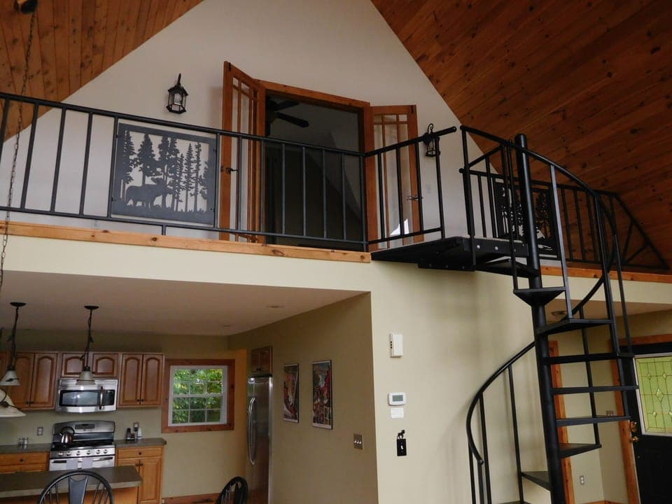 Loft upstairs leading to master bedroom and bath