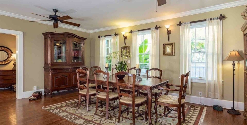 Off the living room sits a spacious dining table, with seating for eight...