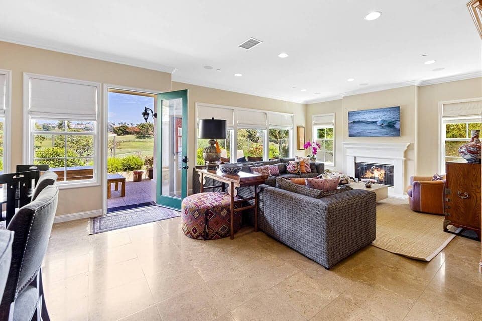 Family room opens to back yard and golf course