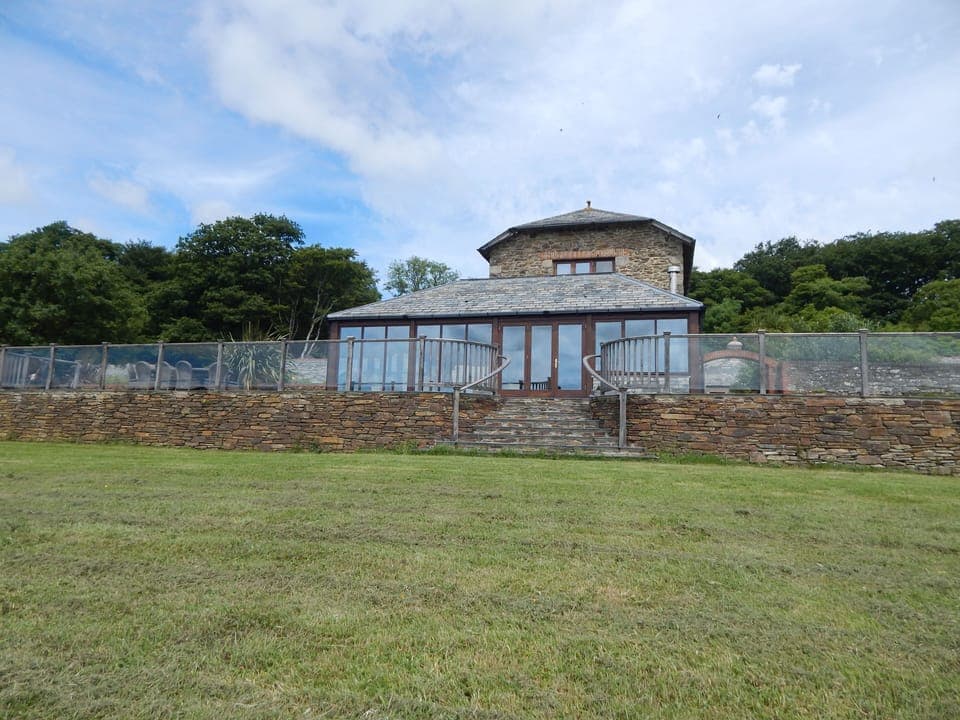The vast patio at is made safe with toughened glass and hand carved balustrade