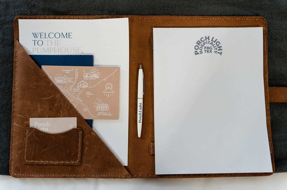 Welcome book – local guide, map, and Porch Light Hospitality details.