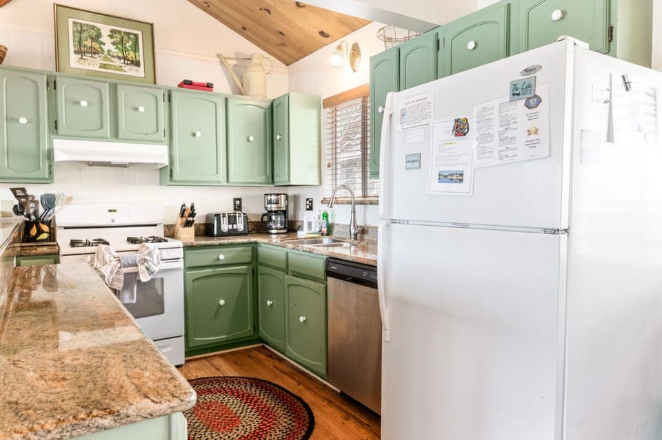 Kitchen - Full kitchen with stove/oven, refrigerator, dishwasher, microwave, blender, toaster, coffee maker, dishes, pots/pans, & more.
