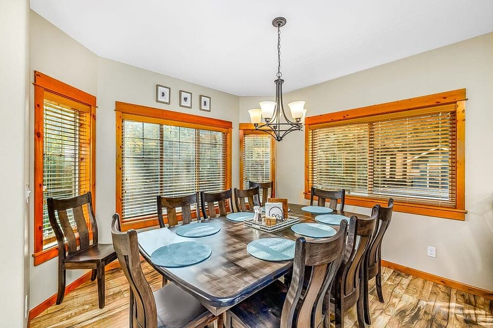 Dining Room With Wraparound Windows And Seating For 10