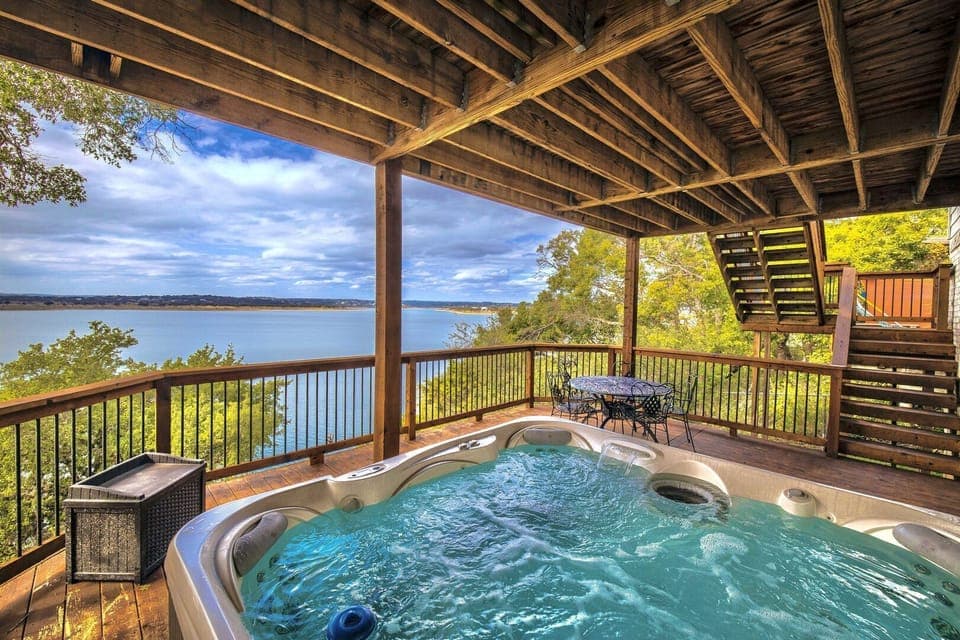 Enjoy the lake views from the covered hot tub