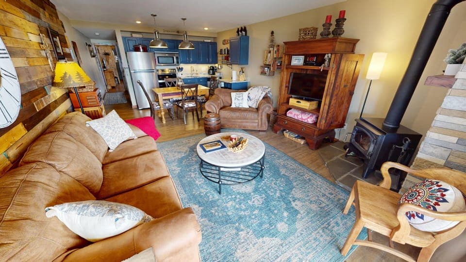 Living Area with Flatscreen, Wood Fireplace - Living Area with Flatscreen, Wood Fireplace