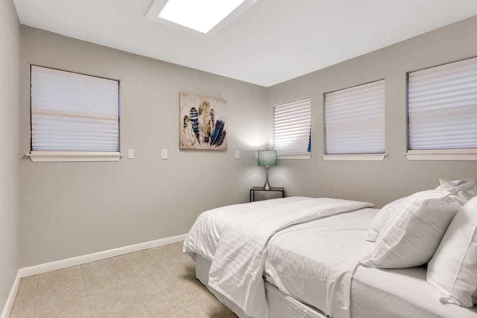 Bedroom 7 is in the smaller home has a luxury queen pillow top with bathroom.