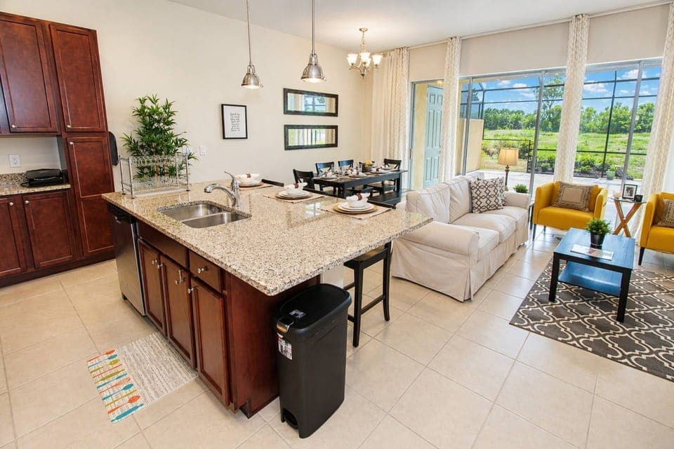 Open Kitchen/Dining/Living room with access to the private patio