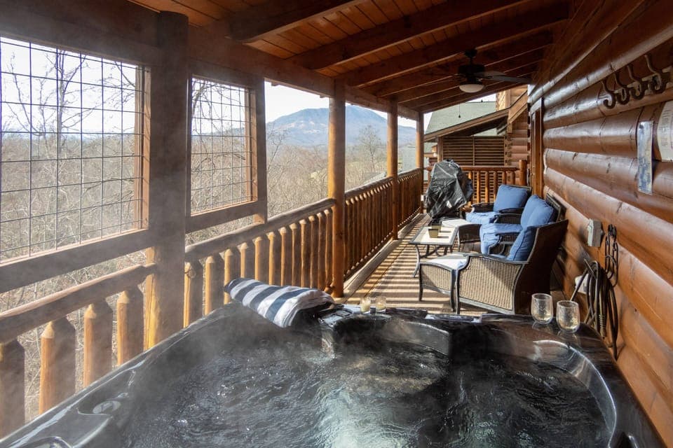 Relax in the covered hot tub while you enjoy the views of Bluff Mountain!