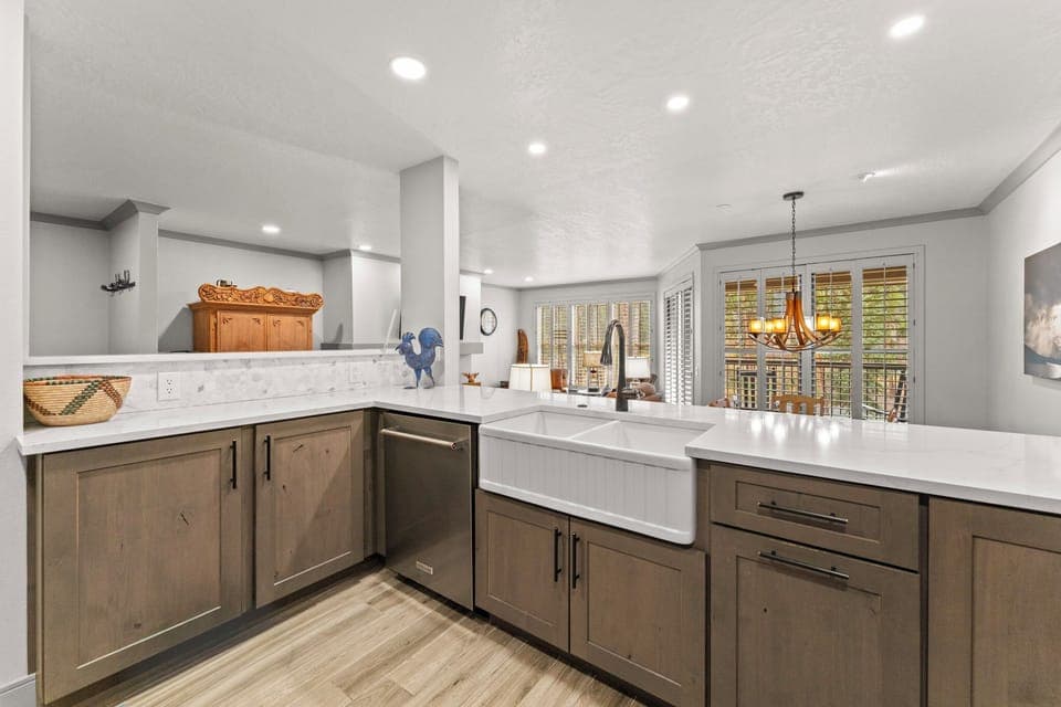 Newly renovated kitchen with granite countertops and stainless steel appliances