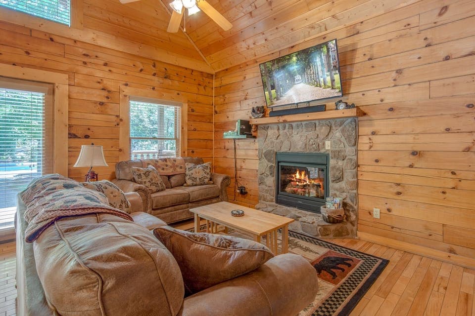 Lounging In The Living Area - Bask in the comforts of this lovely living area. Whether you are looking to lounge with your favorite book, or watch your favorite show, A Mountain Paradise has it all. 