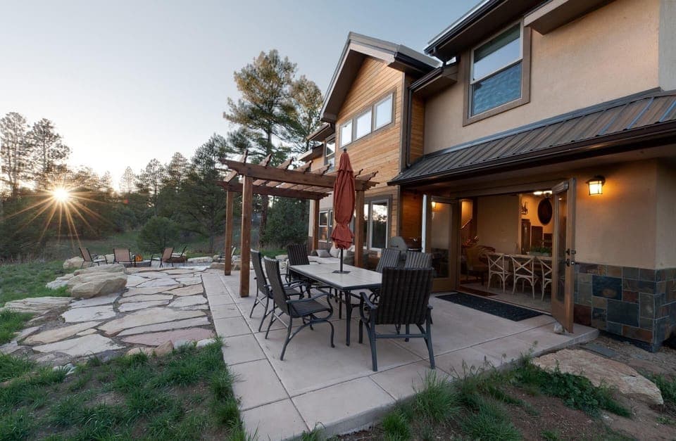 Outdoor living space - Dining Table, BBQ, couch and gas fire pit