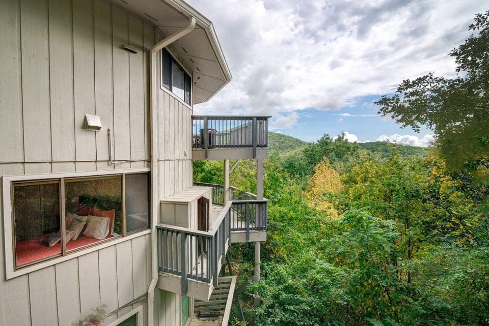Welcome to Hangin' Round—a unique rondette-style home just beyond the iconic stone arches of Montreat!