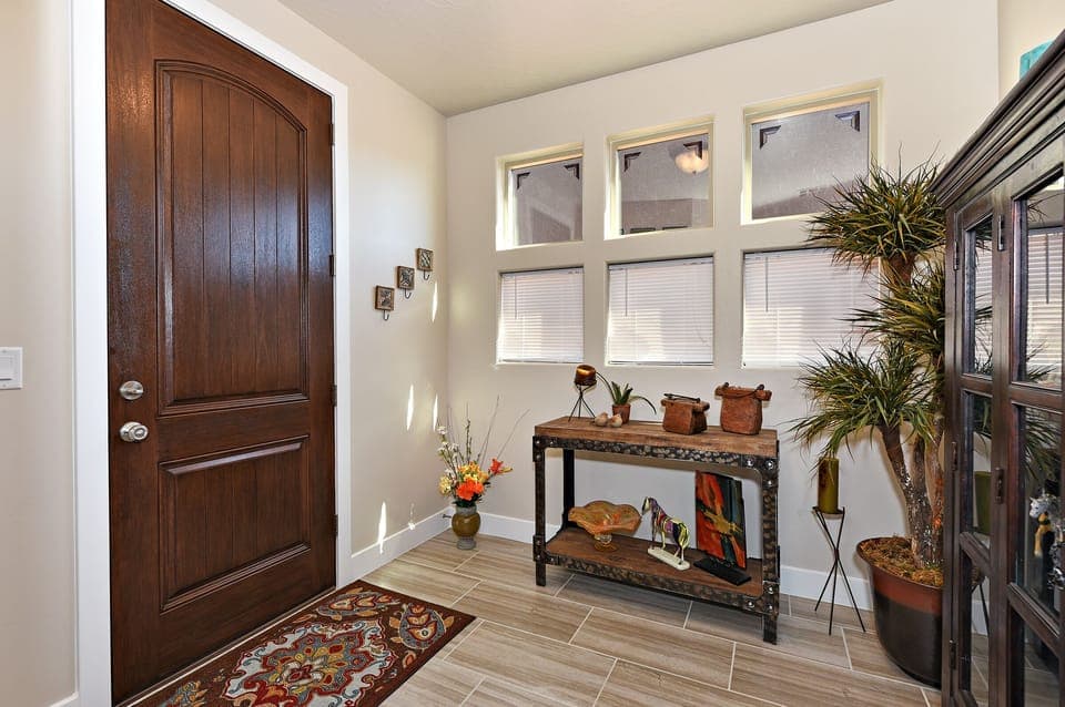 Front Entry - The front entry displays our beautiful collection of painted horses, which welcomes you to our home, The Painted Horse!