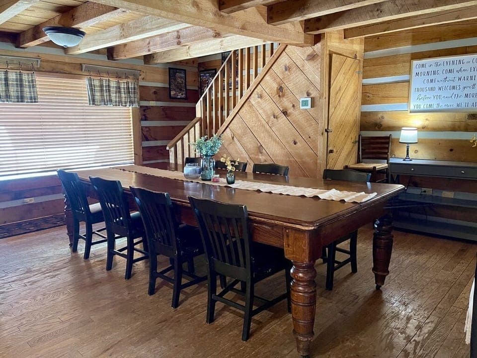 Dining table seats 12 and stairs to 2nd level