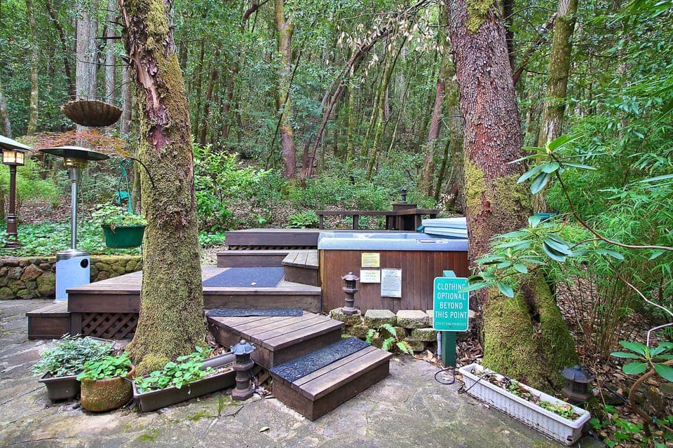 Multiple levels of yard and deck to enjoy the hot tub and friends.
