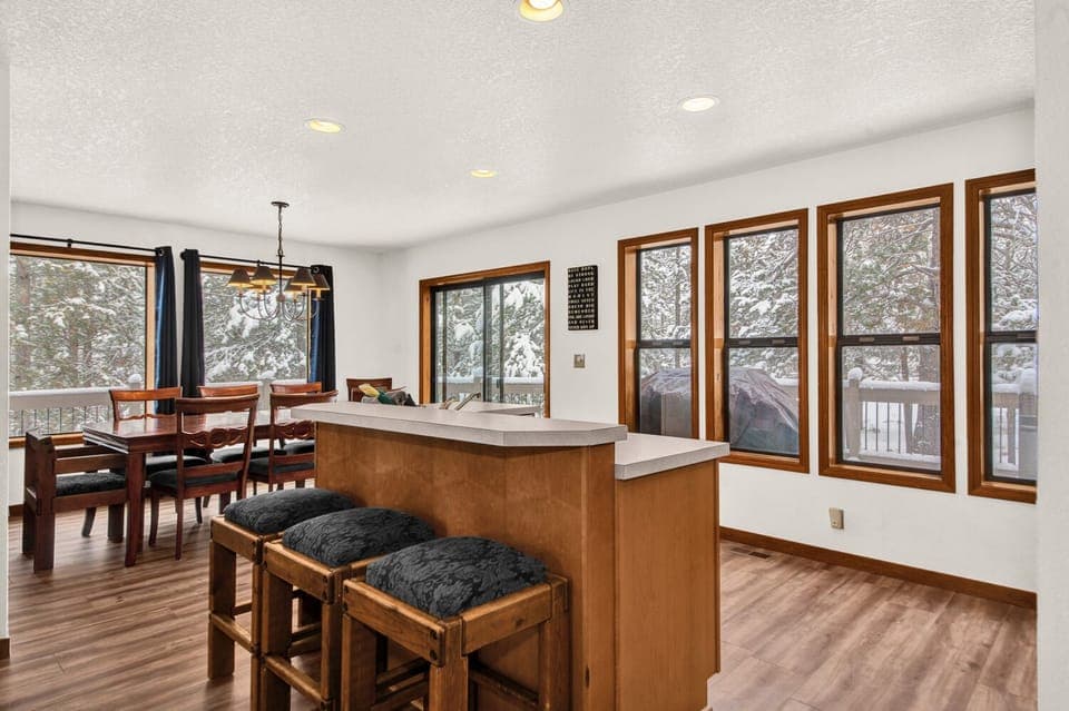 The island has a separate sink and the dishwasher