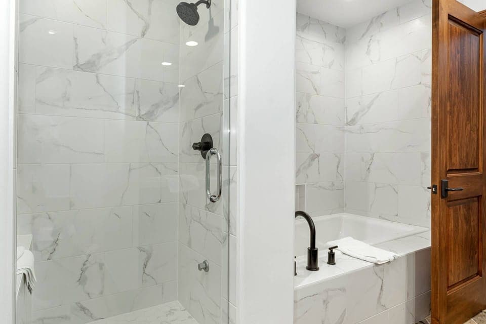 Primary Bedroom Ensuite Bath with newly updated Walk In Shower and Soaking Tub