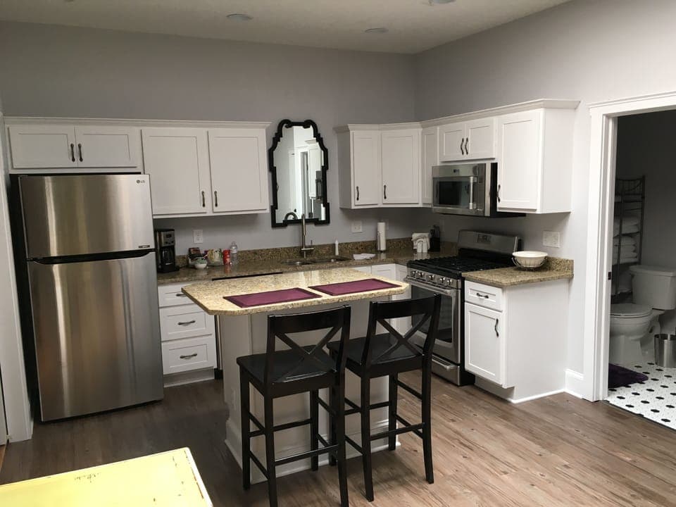 Full kitchen with gas range and granite countertops!