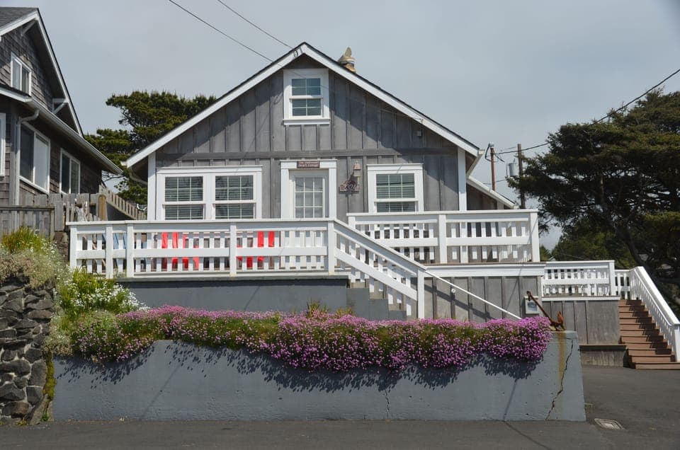 Front view of the cottage with the beach right across the street.