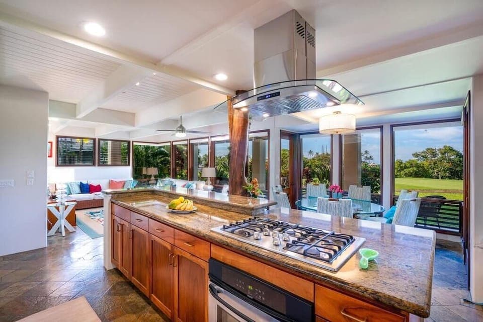 Prepare Meals with a Tropical Golf Course View - Floor to Ceiling Windows