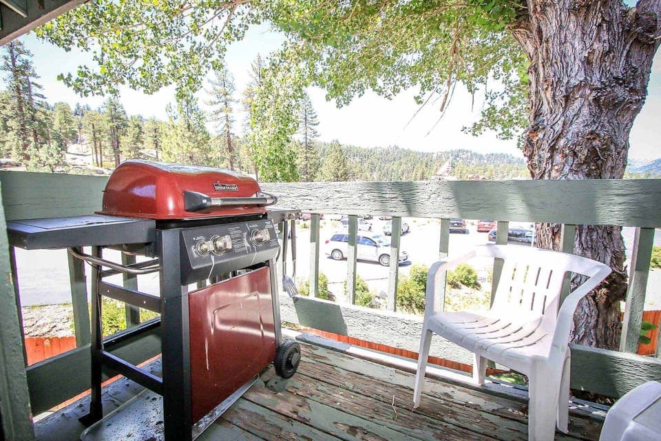 Step out onto your private balcony, equipped with a propane BBQ grill for easy outdoor cooking. This shaded spot is perfect for enjoying a meal while taking in the fresh air and surrounding scenery.