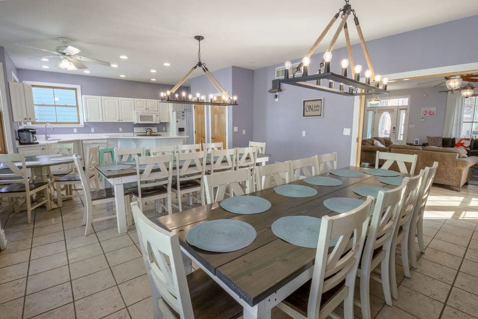Main Level | Dining Room | Kitchen - Gather together around these custom designed farm style tables.