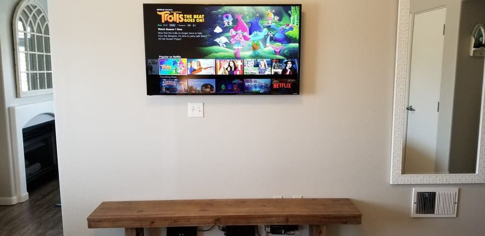 55" smartTV includes Netflix and cable tv service.