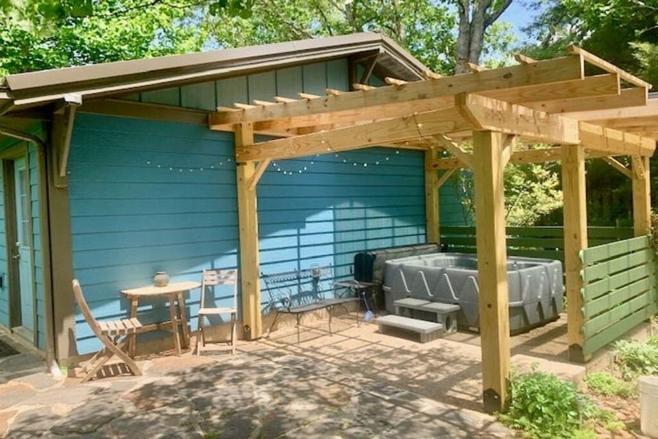 Hot tub, new pergola and privacy screen with string lights
