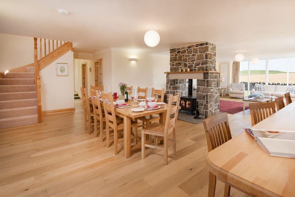 Mill Dowrie - open-plan living area with wood burning stove