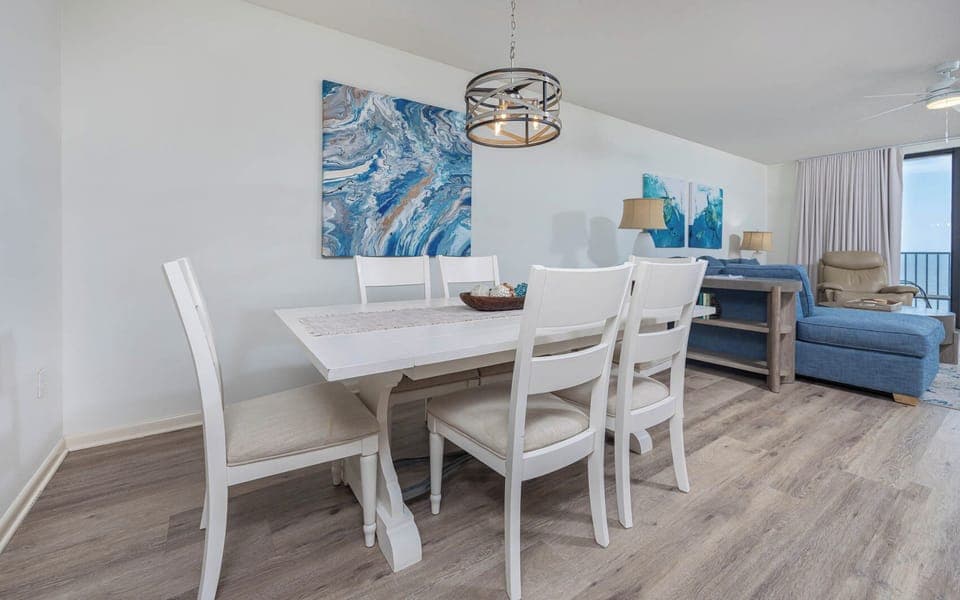Stylish dining area in the living space, perfect for family meals or games for vacation fun and memories