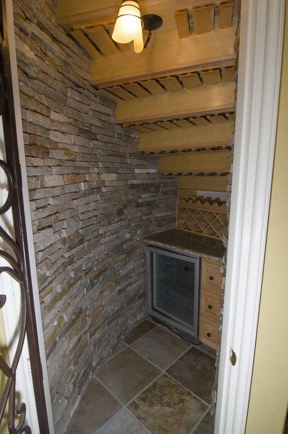 Unique Wine Cave Under Grand Spiral Staircase, Great for Guest Drink Service!