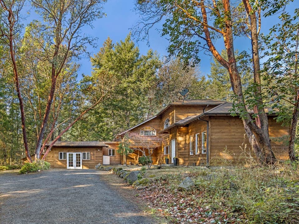 Woodhaven is surrounded by madrona trees.