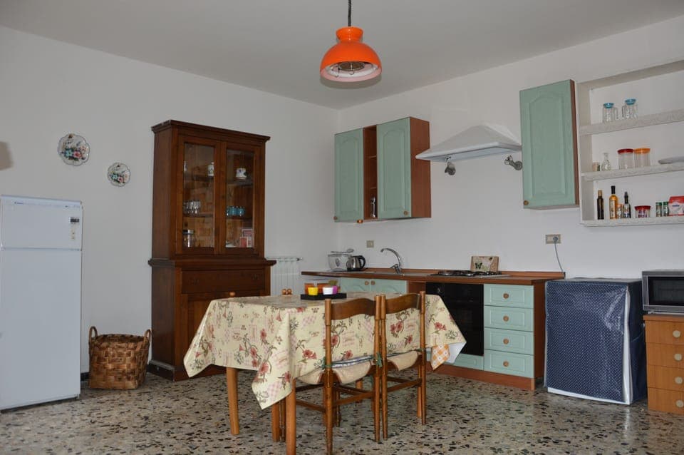 The kitchen is large and well equipped